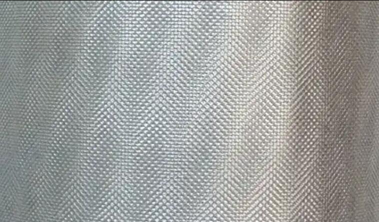 Reflective breathable nonwoven membrane